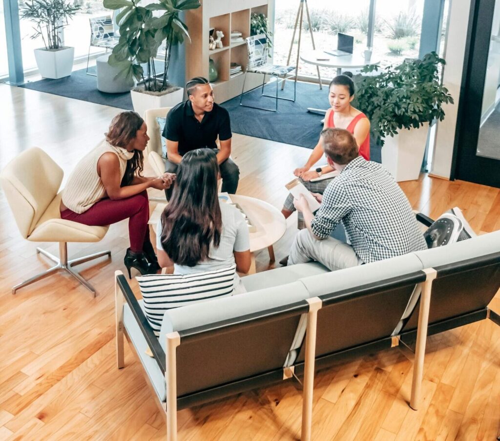 people discussing business optimization